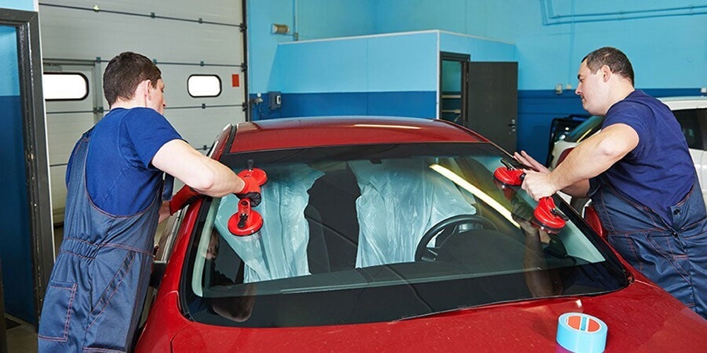 Vehicle windshield being replaced